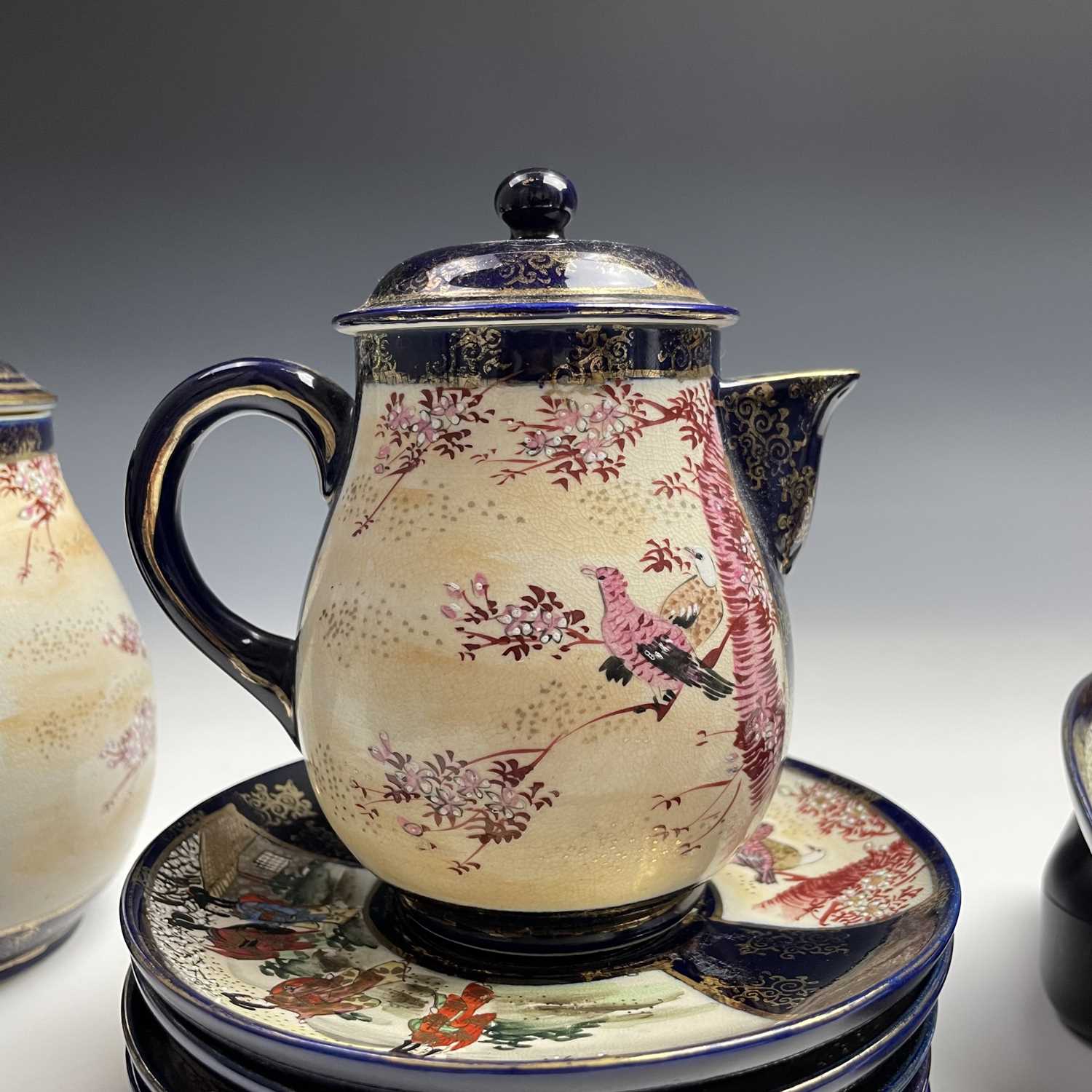 A Japanese satsuma tea service, early 20th century, comprising a teapot, hot water jug, sugar - Image 18 of 18