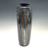A Japanese bronze vase, Meiji period, signed, with overlaid silver bamboo, height 36.5cm, diameter