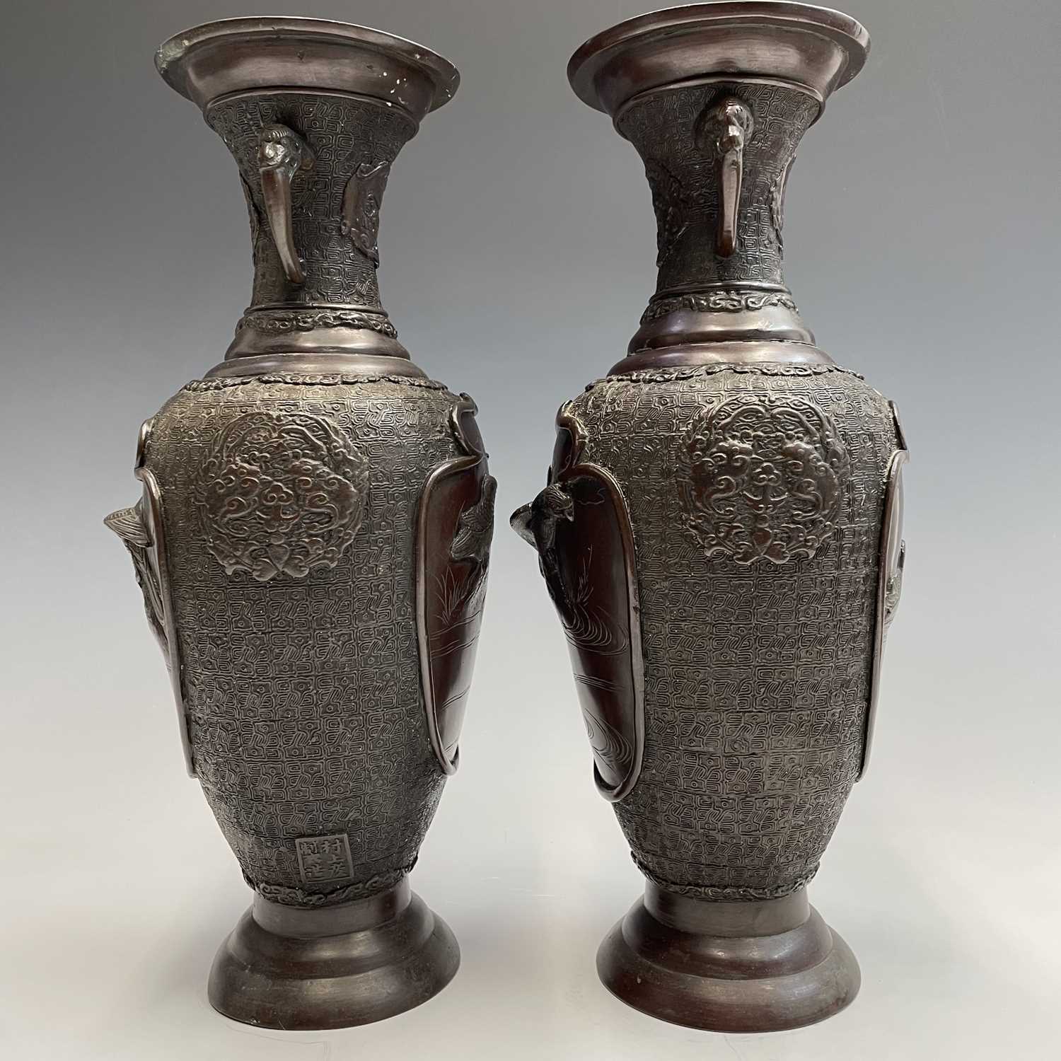 A pair of Japanese bronze twin-handled vases, Meiji period, seal mark, relief decorated with - Image 12 of 12