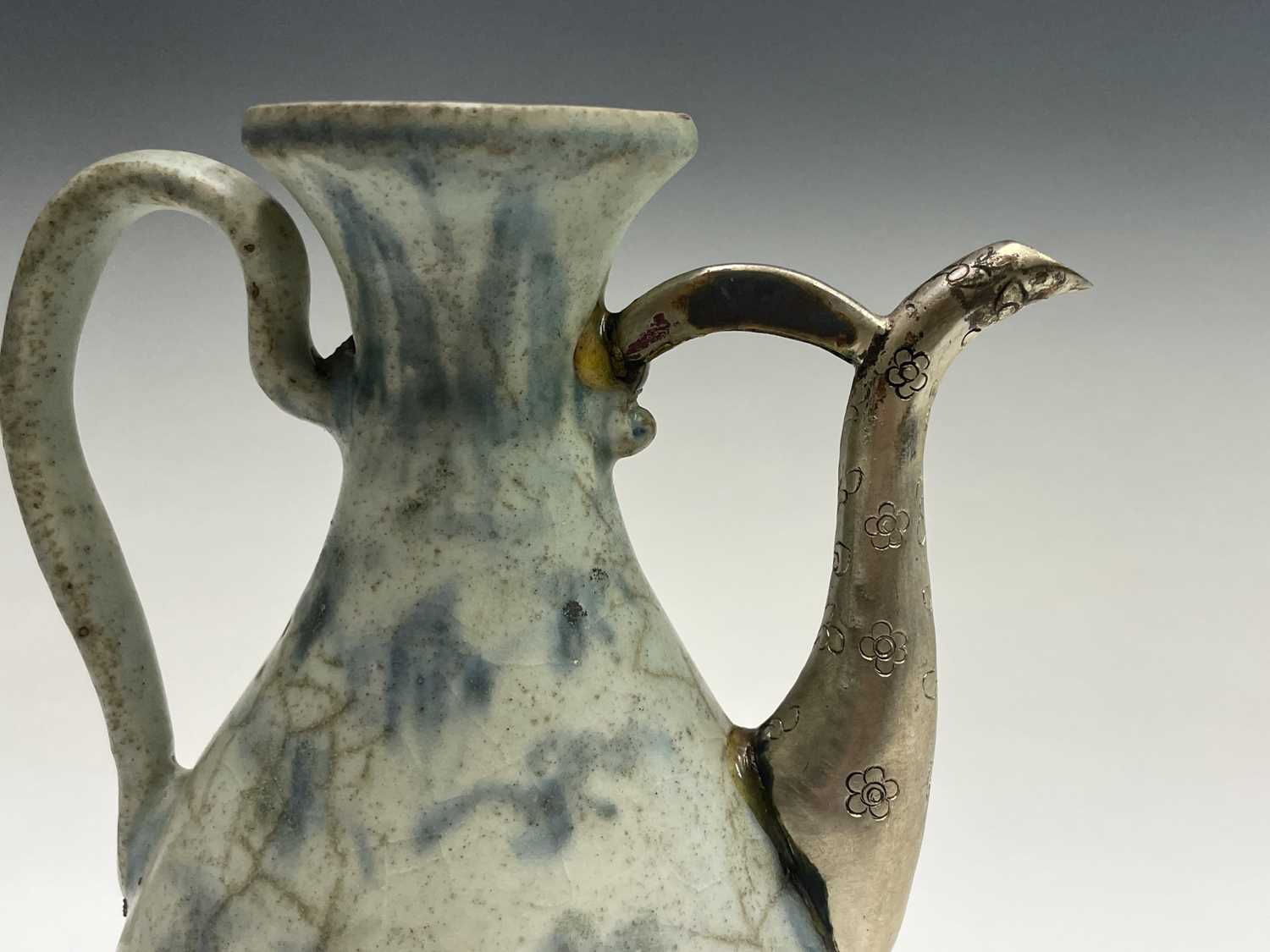 A Chinese blue and white ewer, Ming Dynasty, with white metal spout, height 18.5cm, width 14cm. - Image 4 of 7