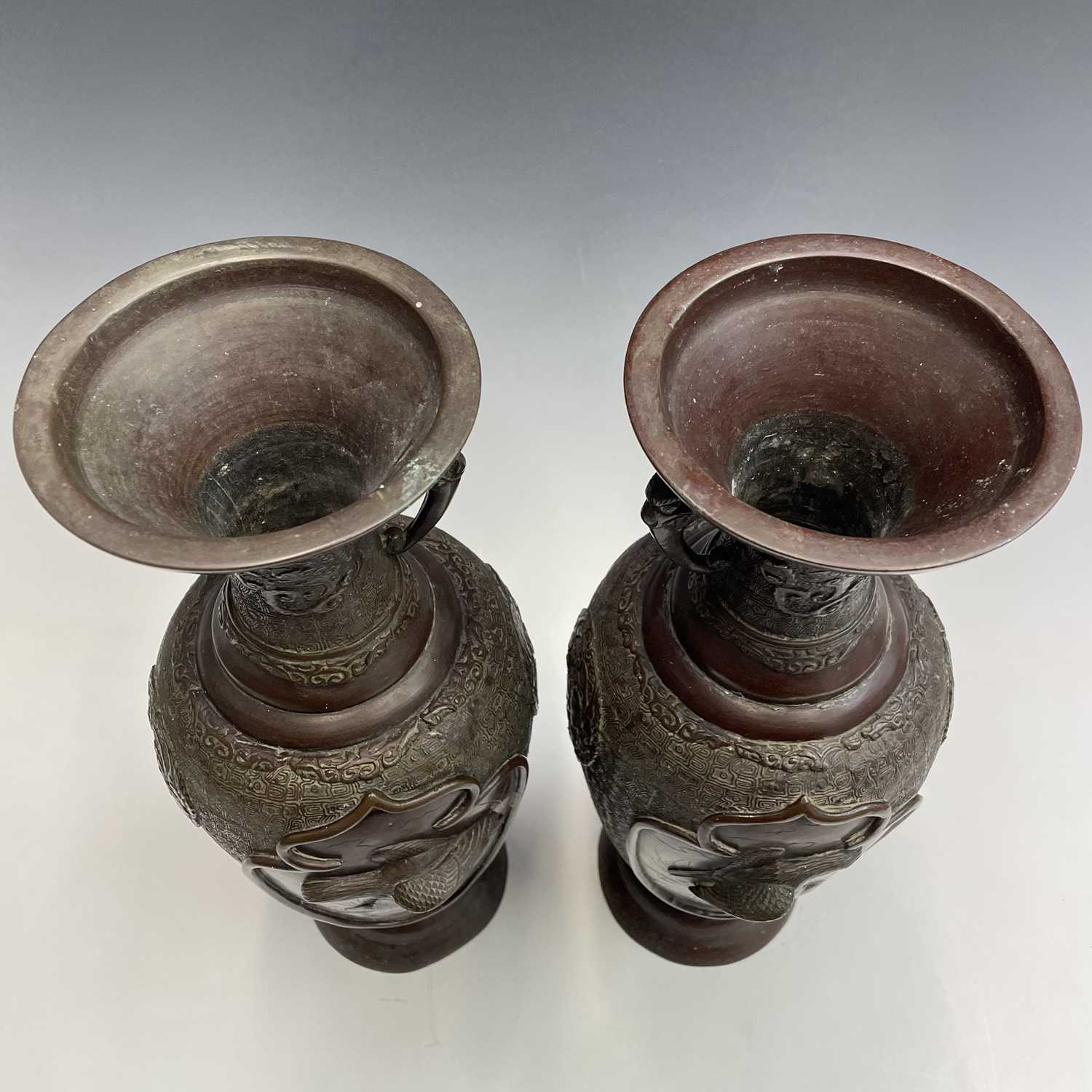 A pair of Japanese bronze twin-handled vases, Meiji period, seal mark, relief decorated with - Image 9 of 12