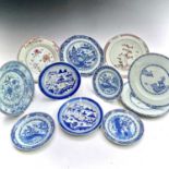 Eleven various Chinese export porcelain plates, 18th century, largest diameter 23cm. Provenance: