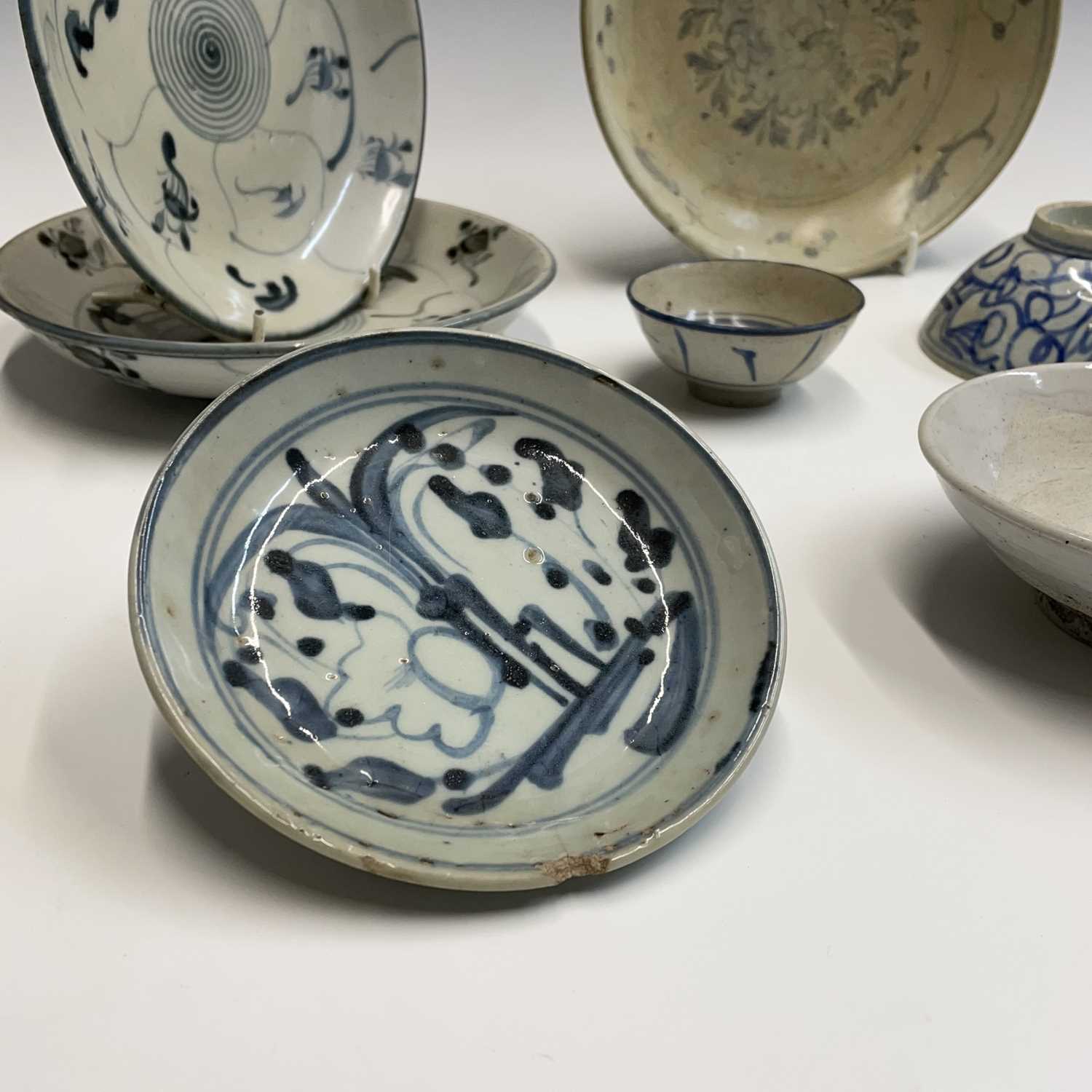 A selection of Chinese provincial pottery bowls and plates, Ming Dynasty, largest dish diameter 19. - Image 6 of 20