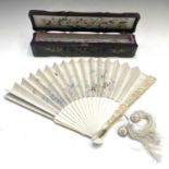 A Chinese Canton carved ivory and silk fan, 19th century, painted with birds, insects and flowers,