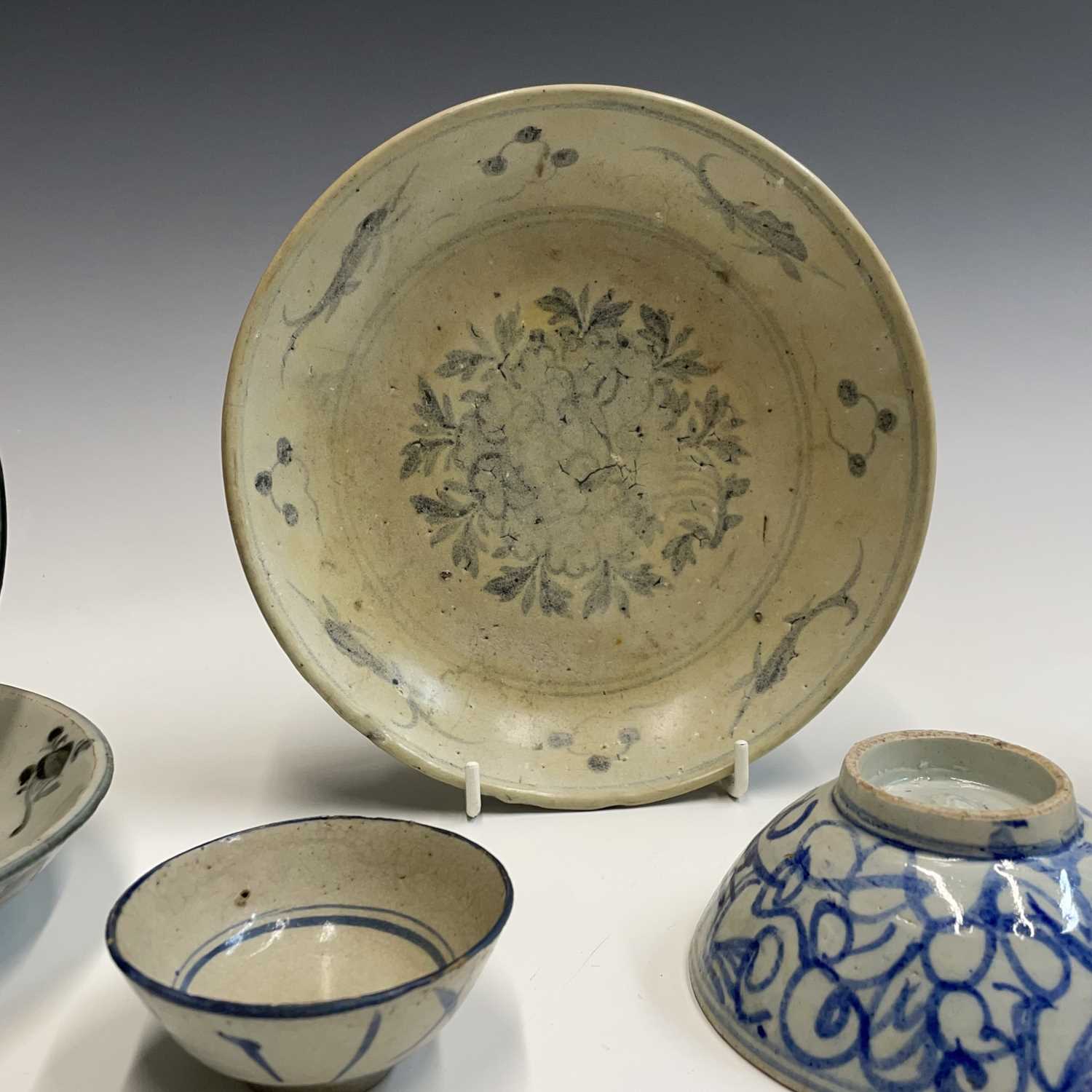 A selection of Chinese provincial pottery bowls and plates, Ming Dynasty, largest dish diameter 19. - Image 14 of 20