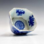 A Chinese blue and white porcelain octagonal pot, 18th century, height 4cm, width 8cm.