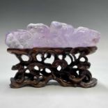 A Chinese scholars amethyst brush rest, 19th century, on original carved wooden stand, total
