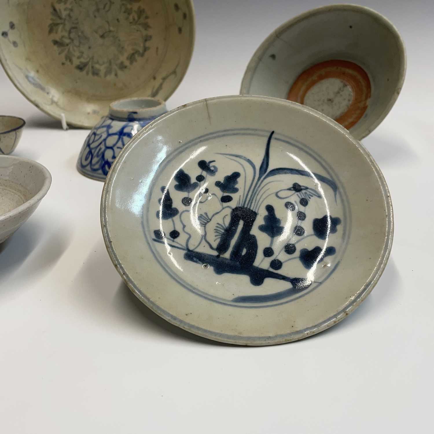 A selection of Chinese provincial pottery bowls and plates, Ming Dynasty, largest dish diameter 19. - Image 2 of 20