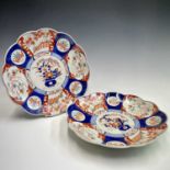 A pair of Japanese Imari porcelain chargers, early 20th century, diameter 31cm.