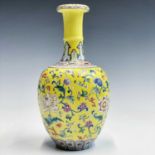 A Chinese famille rose porcelain vase, 19th century, gilt Qianlong mark, the yellow ground with