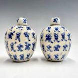 A pair of Chinese porcelain 'one hundred boys' jars and covers, late 19th century, height 8.5cm,