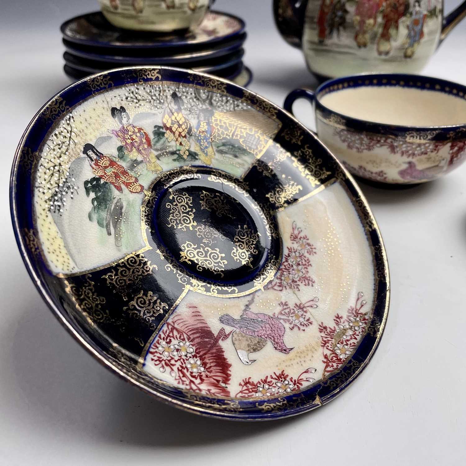 A Japanese satsuma tea service, early 20th century, comprising a teapot, hot water jug, sugar - Image 17 of 18