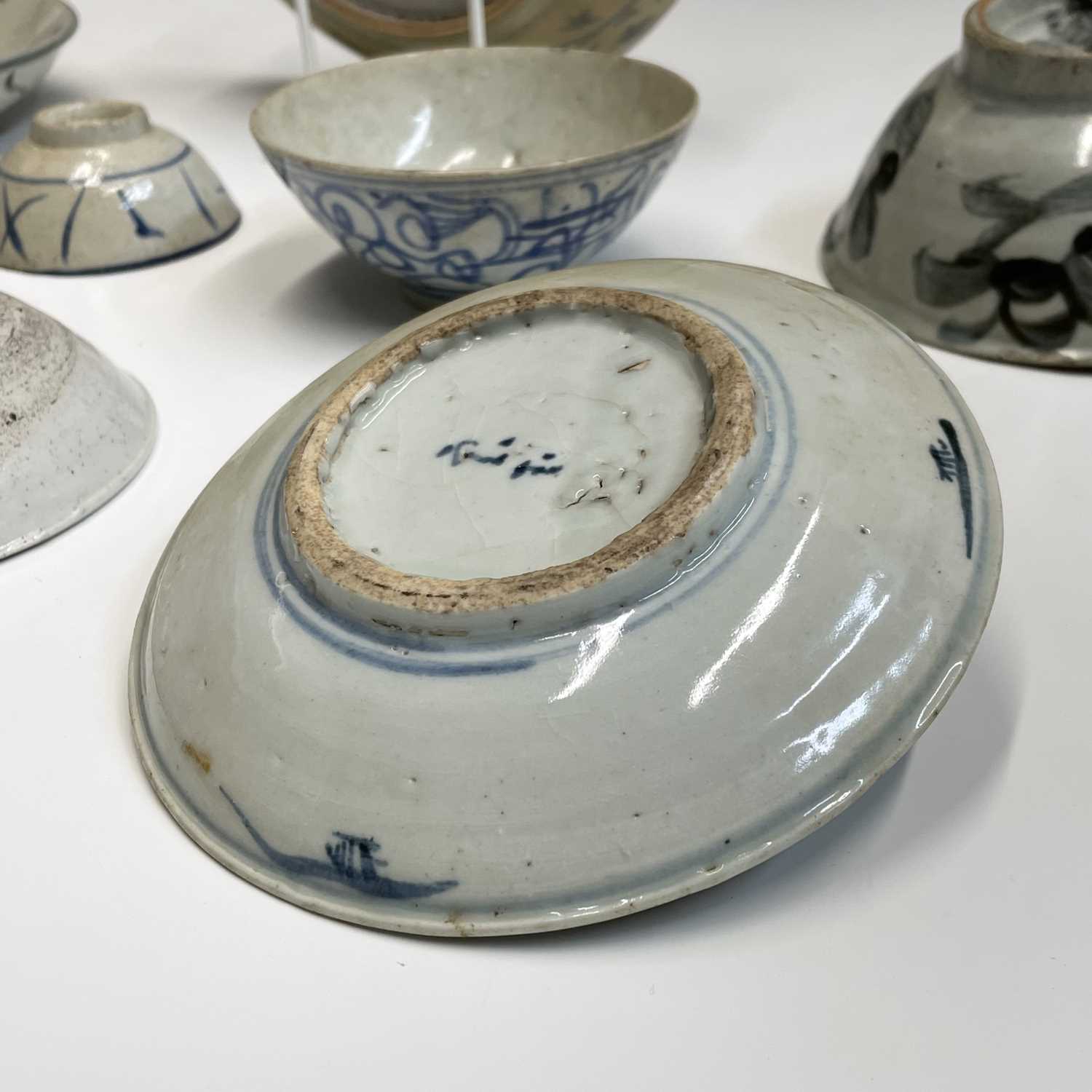 A selection of Chinese provincial pottery bowls and plates, Ming Dynasty, largest dish diameter 19. - Image 12 of 20