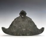 A Chinese bronze temple gong, of archaic pagoda form, 20.7 x 33.5cm, depth 1.5cm.