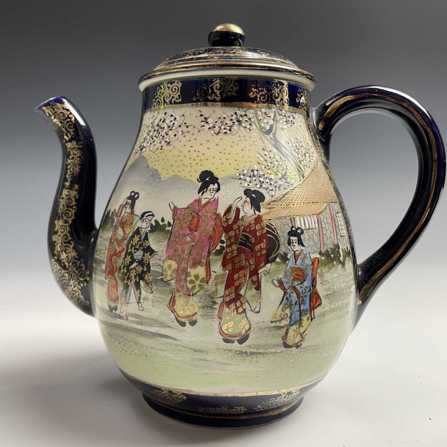 A Japanese satsuma tea service, early 20th century, comprising a teapot, hot water jug, sugar - Image 8 of 18