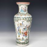A Chinese famille rose porcelain vase, late 19th century, the ground with mulitple flowerheads and