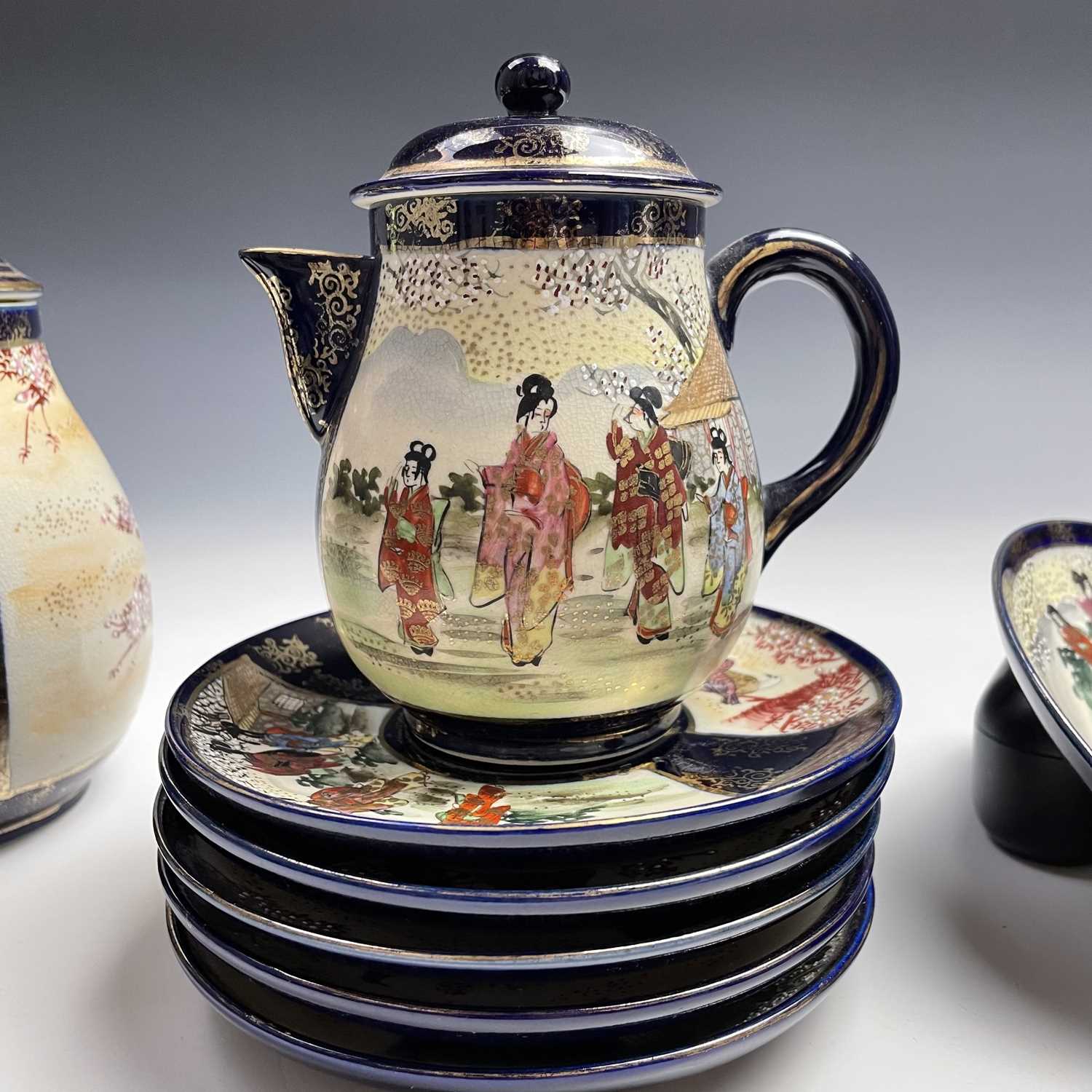 A Japanese satsuma tea service, early 20th century, comprising a teapot, hot water jug, sugar - Image 4 of 18