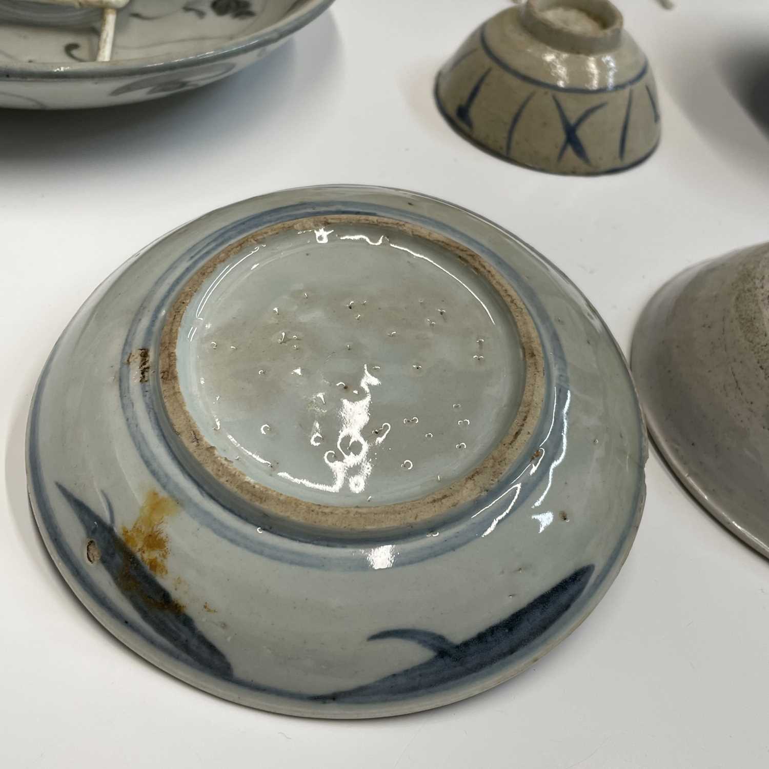 A selection of Chinese provincial pottery bowls and plates, Ming Dynasty, largest dish diameter 19. - Image 10 of 20