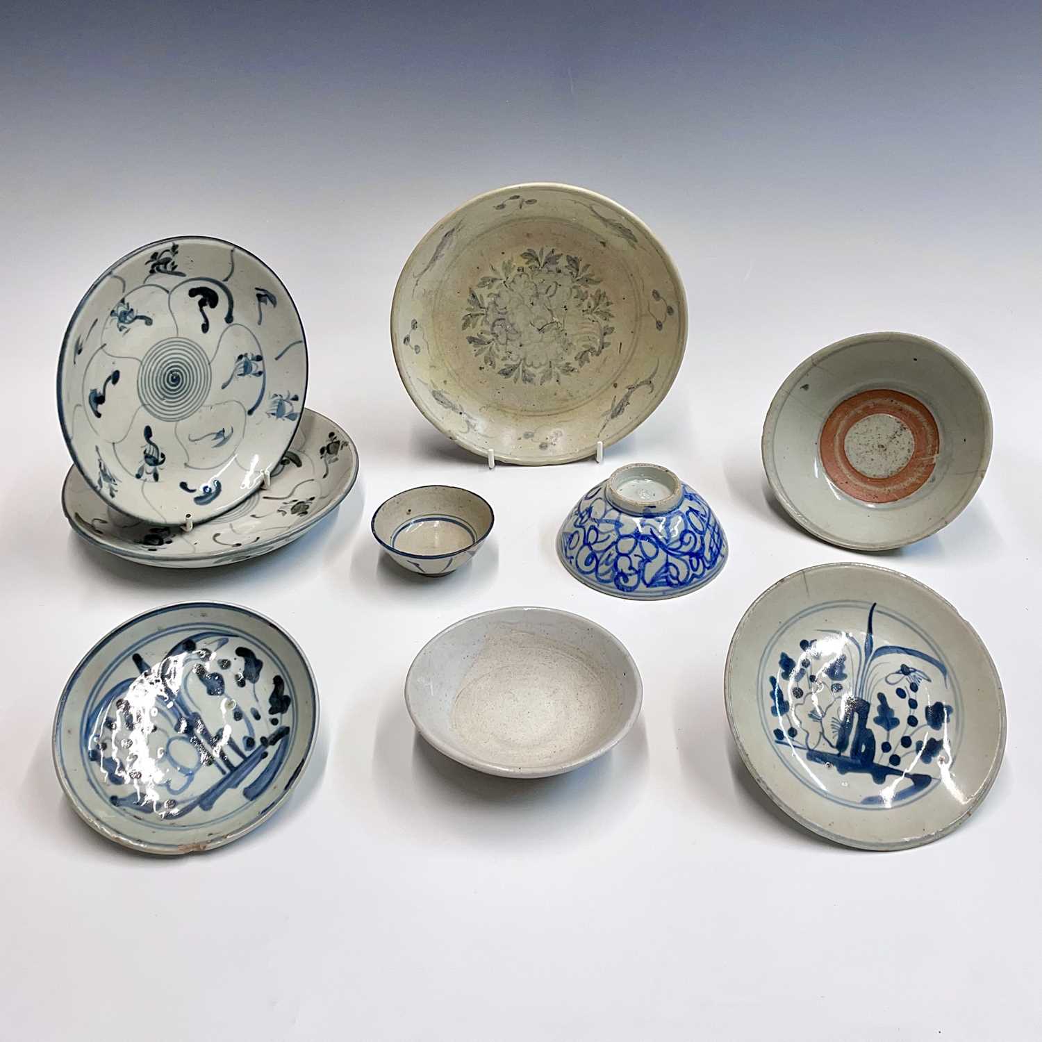 A selection of Chinese provincial pottery bowls and plates, Ming Dynasty, largest dish diameter 19.