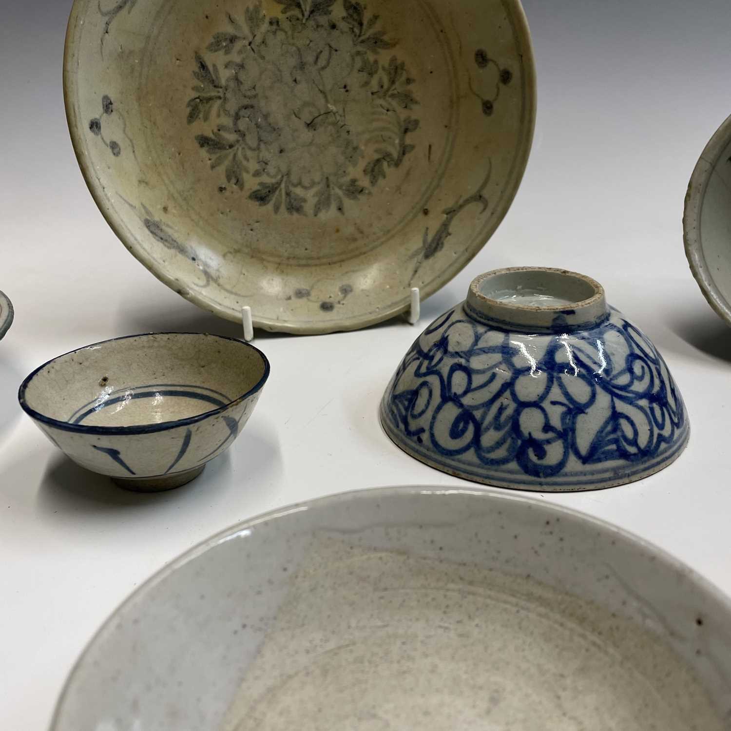A selection of Chinese provincial pottery bowls and plates, Ming Dynasty, largest dish diameter 19. - Image 16 of 20