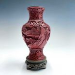 A Chinese cinnabar lacquer vase on stand, with blue enamel interior and base, total height 20cm,