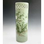 A Chinese celadon porcelain stick stand, early 20th century, of cylindrical form, with pierced