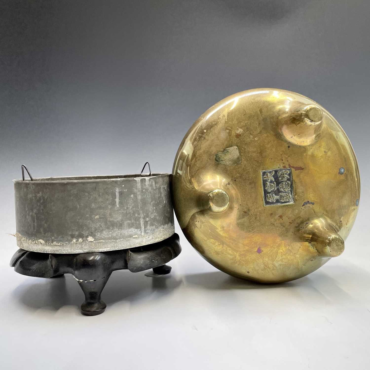 A large Chinese polished bronze censer, six character Xuande mark, with loop handles and three - Image 4 of 14