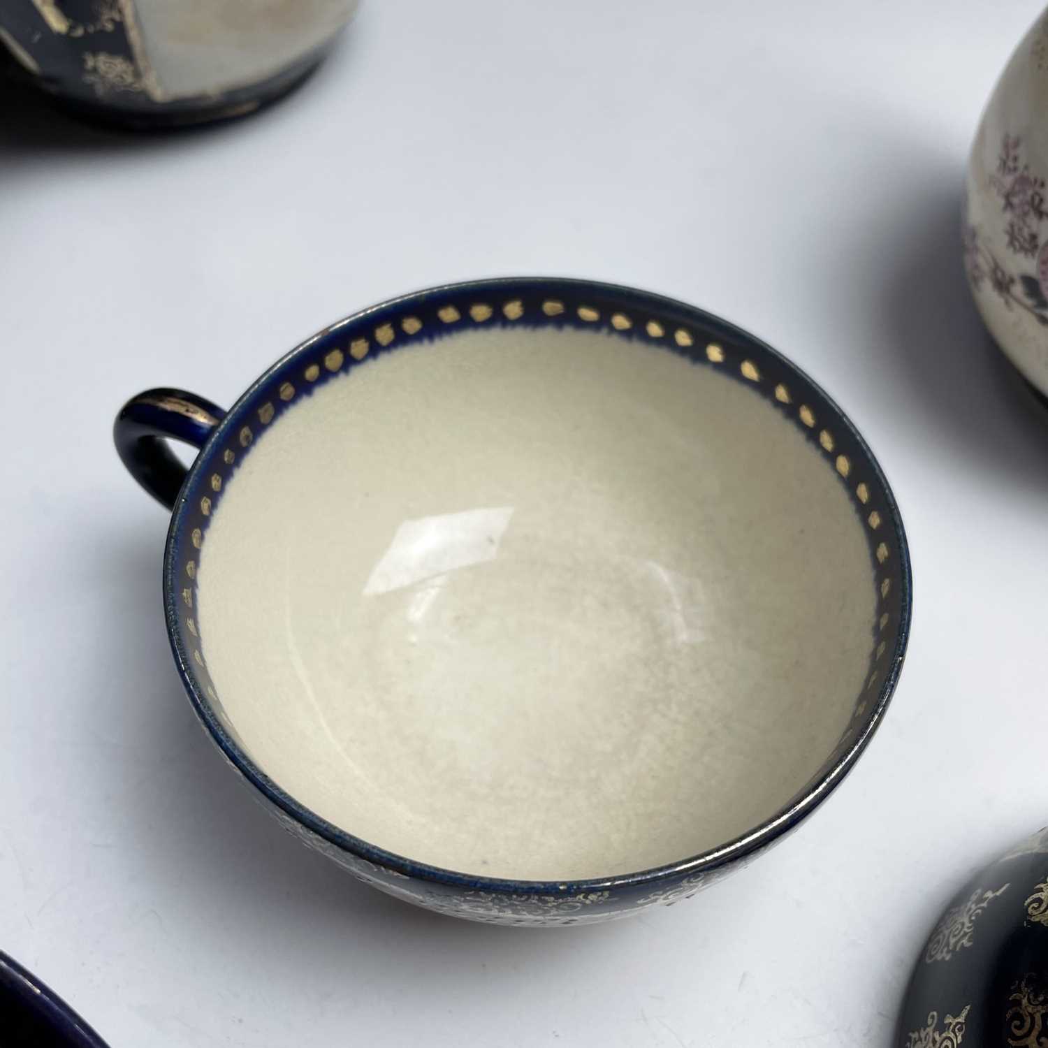 A Japanese satsuma tea service, early 20th century, comprising a teapot, hot water jug, sugar - Image 9 of 18