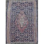 A Senneh Kelim, West Persia, circa 1900, with the all over herati pattern, the indigo field with a