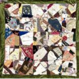 A unusual patchwork quilt, circa 1920's, embroidered by a Falmouth lady who had been a missionary in