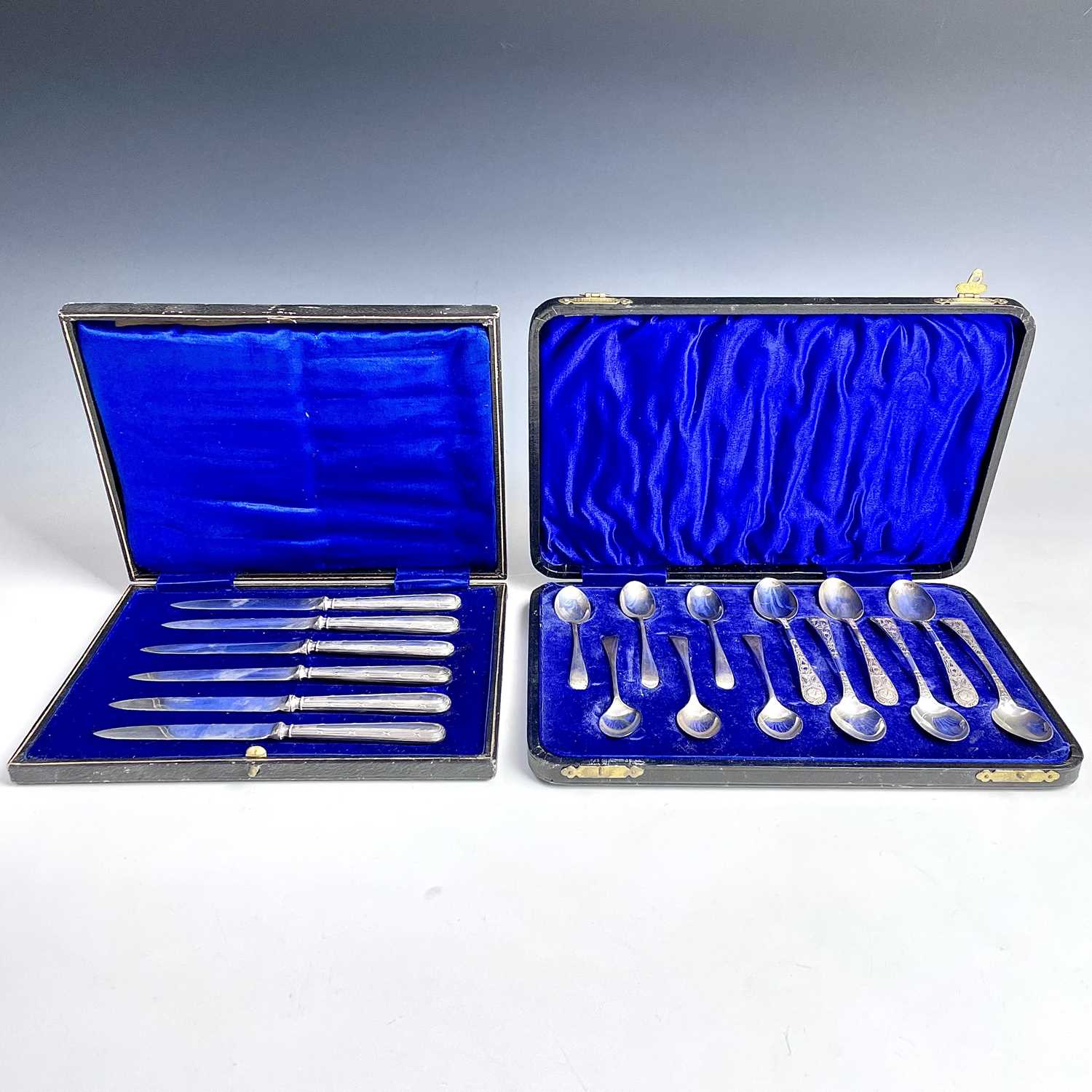 A Victorian silver set of six teaspoons with cast handles, London 1896; together with a set of six