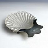 A Victorian silver scallop shell butter dish by Walker & Hall, raised on triple scallop moulded