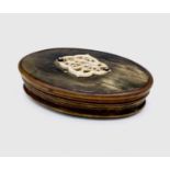 A Scottish horn and bone mounted oval snuff box, length 88mm, width 50mm.