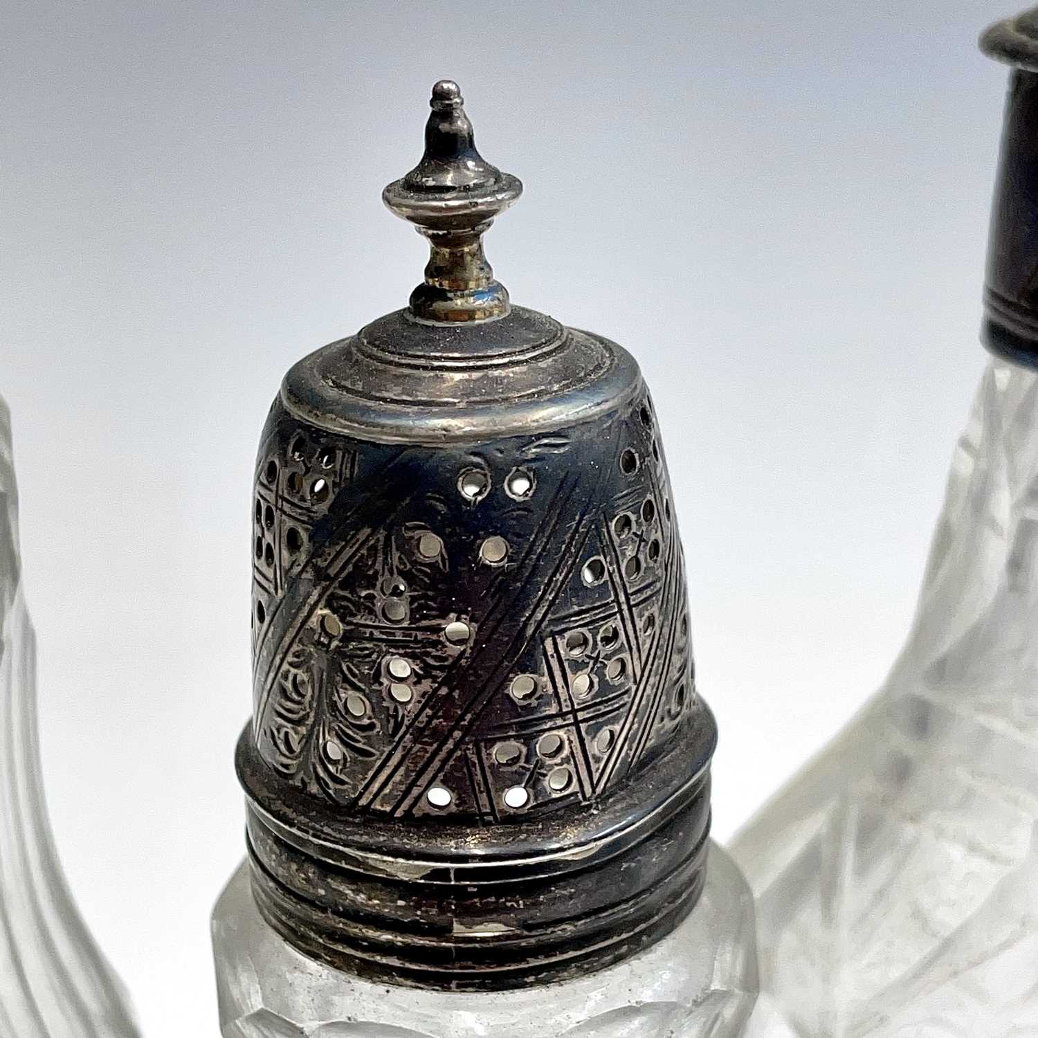 A collection of eight Georgian facet and cut glass cruet bottles with silver lids, all unmarked, the - Image 7 of 7