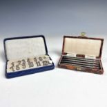 A cased set of four sterling silver propelling pencils for cards, together with a cased set of 12 .