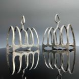 A pair of George V silver four section toast racks by William Hutton & Sons, Sheffield 1917, width