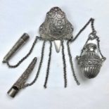 A Victorian silver chatelaine by Lawrence Emanuel, Birmingham 1899, the clip cast with an oval still