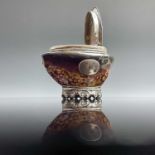 A 19th century silver plate mounted cowrie shell table snuff box, width 8cm.