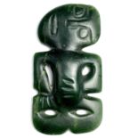 An extremely rare Maori human form hei-tiki pendant, green nephrite jade, possibly pounamu, the head