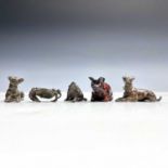 A pair of miniature bronze models of recumbent dogs, length 5cm; together with a Japanese