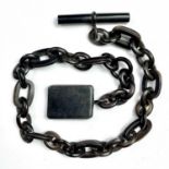 A horn watch chain albert, length 28.5cm.