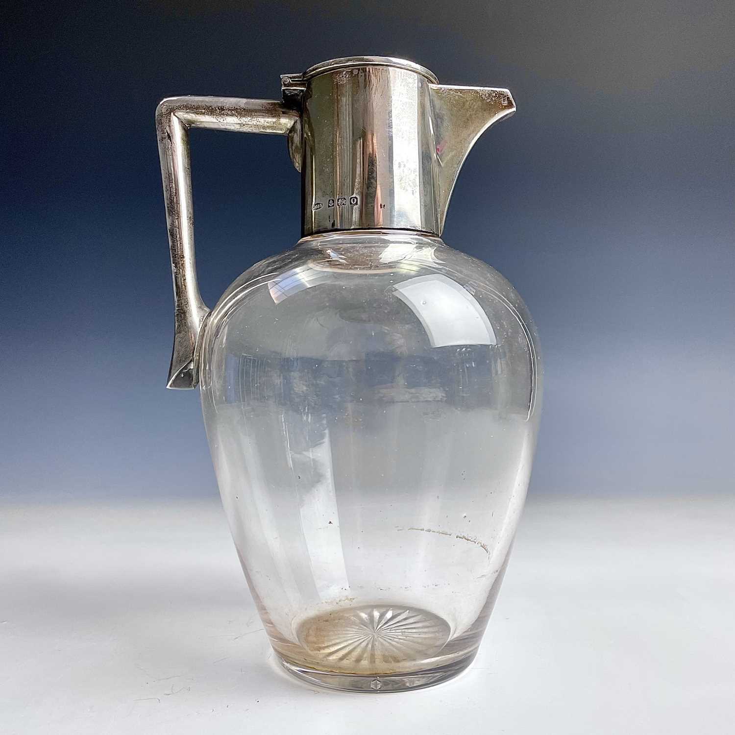 A George V silver mounted glass claret jug by John Grinsell & Sons, Birmingham 1913, height 19.5cm.