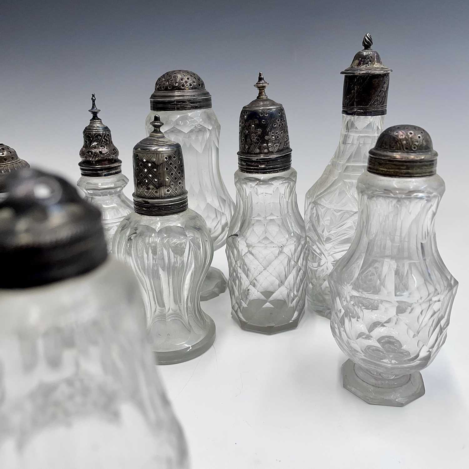 A collection of eight Georgian facet and cut glass cruet bottles with silver lids, all unmarked, the - Image 2 of 7