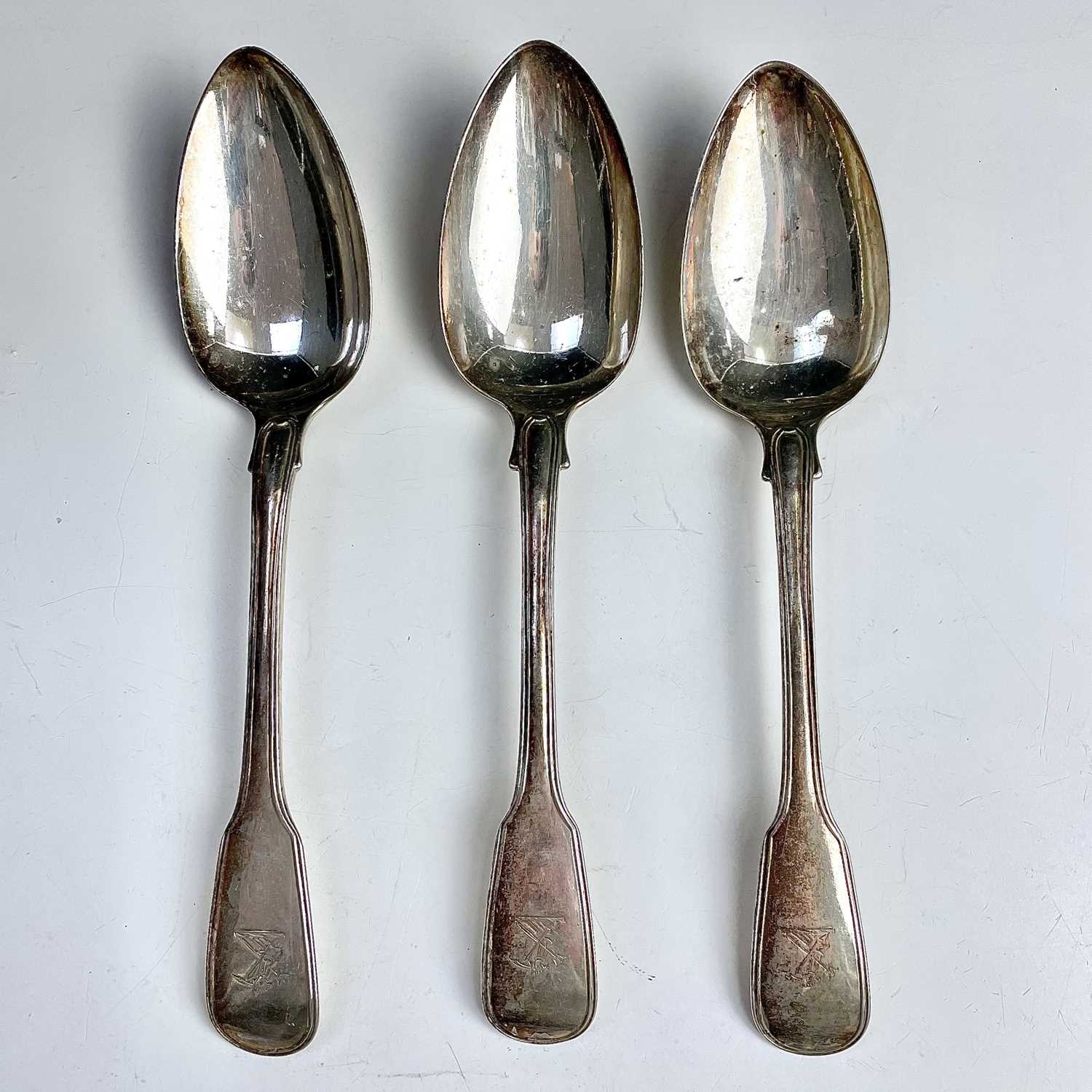A set of three George III fiddle and thread pattern table spoons, maker F.H, London 1820/21,