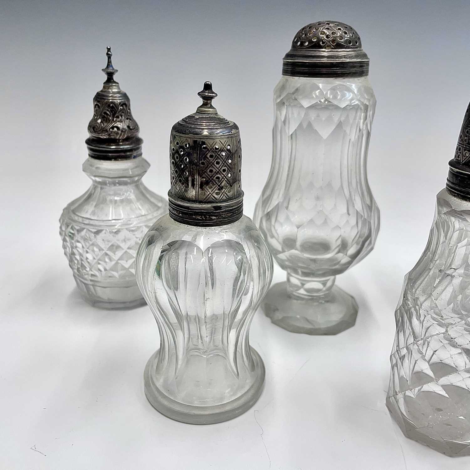 A collection of eight Georgian facet and cut glass cruet bottles with silver lids, all unmarked, the - Image 5 of 7