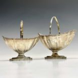 A good pair of George III silver graduated swing handled sugar baskets by Samuel Godbehere and