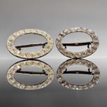 A pair of Georgian steel paste set oval shoe buckles, 65mm x 75mm.