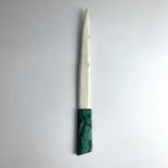 An early 20th century paper knife, with ivory blade and malachite handle, length 28cm.