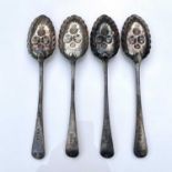 Four George III silver berry spoons, each with identical decoration with bright cut handles,