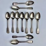 A William IV silver set of six fiddle pattern teaspoons, maker LS, London 1830; together with a
